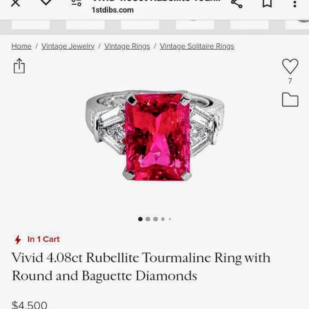6carat vivid rubilite with two 1/2 carat diamonds. They all glow in uv lite